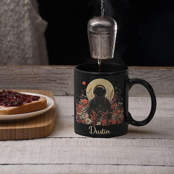 Astronaut with Moon and Wildflowers Coffee Mug, Custom Name Ceramic Cup 11oz 15oz, Unique Astronaut Coffee Cup for Friends, Personalized Astronomy Black Mug, Gifts for Birthday